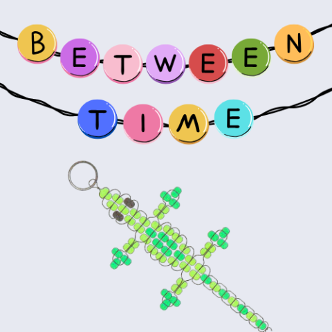 beads that spell "Between Time" with a beaded lizard keychain in the background. 